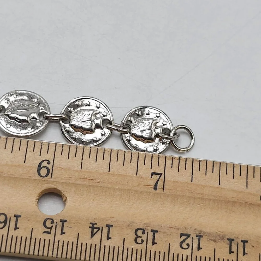 Silver Tone Coin Charm Bracelet With Leaf Embossed Design 7 Inches Lobster Clasp